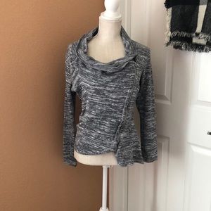 a zip up grey half turtle neck jacket